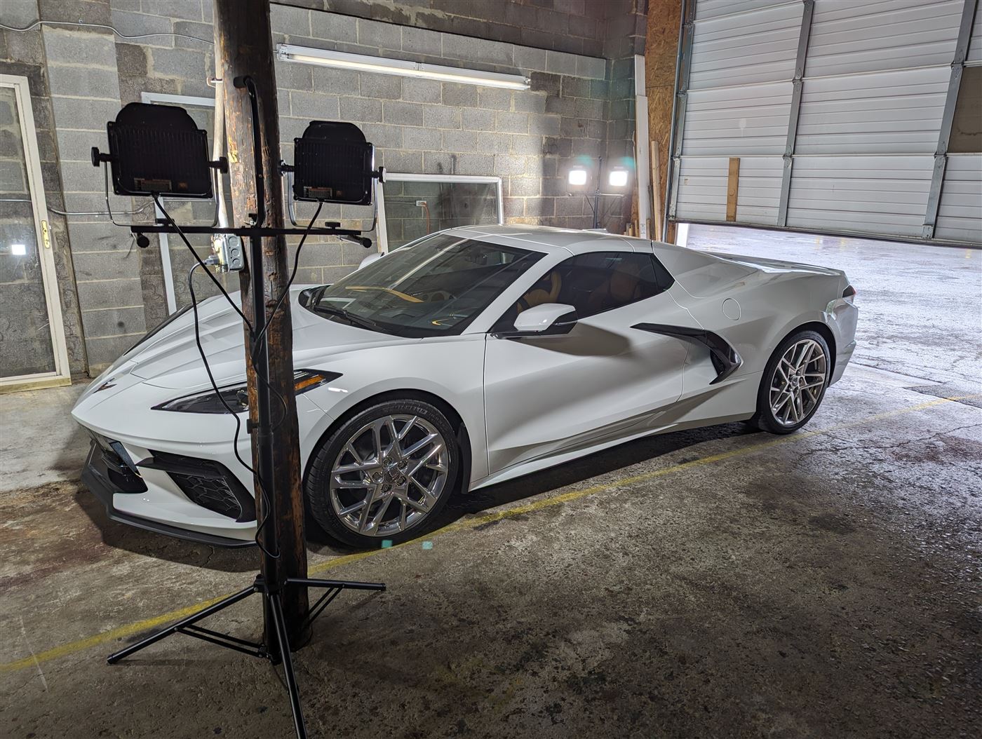 White Corvette C8 in the tint studio